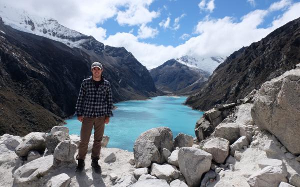 Student with mountains in background